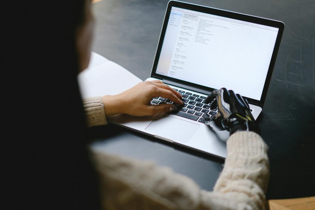 Recruiter working with AI tools to streamline hiring tasks